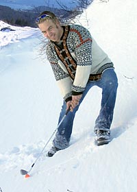 Reid playing snow golf